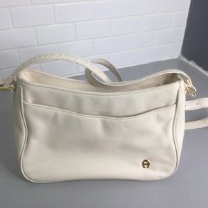 Etienne Aigner leather cream crossbody bags